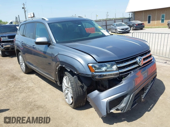 2019 Volkswagen Atlas SEL z VIN 1V2ER2CA5KC555568, wystawiony jako IAAI lot #42050516 z przebiegiem 71 599 mil mil oraz . Historia ofert i sprzedaży dostępna na DreamBid. Obrazek 1.
