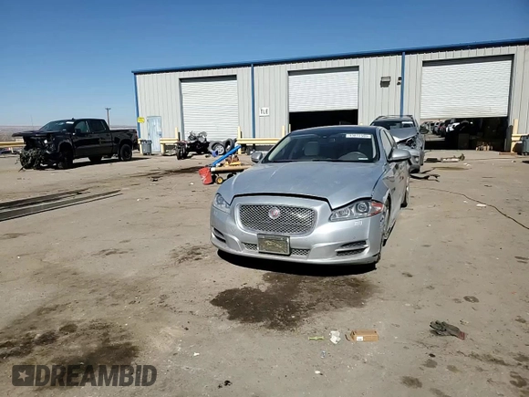 2014 Jaguar XJ Portfolio with VIN SAJWA2GZ2E8V70065, listed as a Copart auction lot 43872505 with 138,677 mi miles and Salvage title. Bid and sale history available at DreamBid. Image 11.