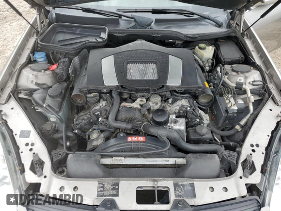 2005 Mercedes-Benz SLK 230/320 z VIN WDBWK56F95F039444, wystawiony jako Copart lot #59275854 z przebiegiem 100 681 mil mil oraz Szkoda całkowita • Salvage title. Historia ofert i sprzedaży dostępna na DreamBid. Obrazek 11.