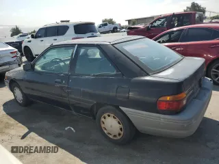1992 Ford Escort z VIN 1FAPP11JXNW156984, wystawiony jako Copart lot #63462264 z przebiegiem 37 774 mil mil oraz Szkoda całkowita • Salvage title. Historia ofert i sprzedaży dostępna na DreamBid. Obrazek 2.