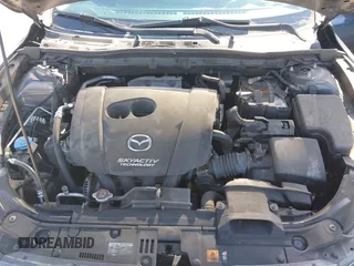 2016 Mazda Mazda3 i Grand Touring with VIN JM1BM1X79G1278079, listed as a IAAI auction lot 42010729 with 104,797 mi miles. Bid and sale history available at carsss.com. Image 10.