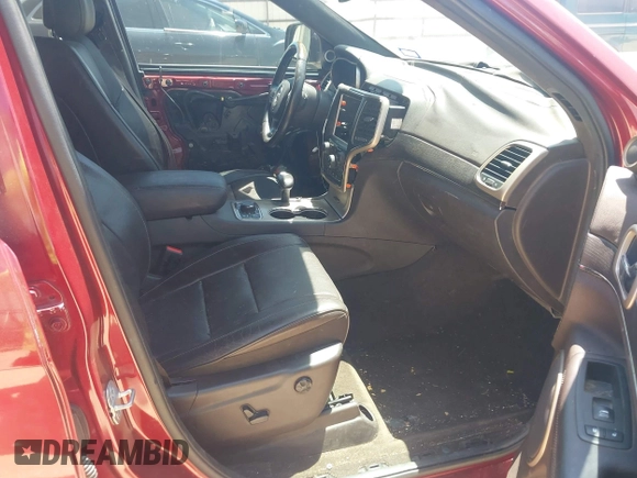 2014 Jeep Grand Cherokee Summit with VIN 1C4RJFJT1EC237358, listed as a IAAI auction lot 42602245 with 106,821 mi miles and . Bid and sale history available at DreamBid. Image 5.
