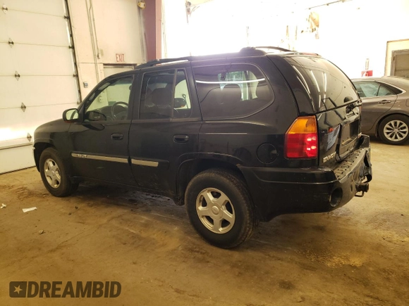 2003 GMC Envoy SLT with VIN 1GKDT13S732208692, listed as a Copart auction lot 67475514 with 243,146 mi miles and Salvage Title. Bid and sale history available at carsss.com. Image 2.