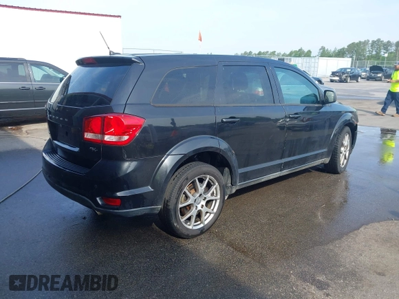 2013 Dodge Journey R/T with VIN 3C4PDCEG7DT682670, listed as a IAAI auction lot 42057985 with 221,755 mi miles and . Bid and sale history available at DreamBid. Image 4.