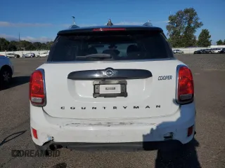 2019 MINI Countryman Cooper with VIN WMZYV5C51K3F57741, listed as a Copart auction lot 71293094 with 64,761 mi miles and Salvage Title. Bid and sale history available at carsss.com. Image 6.