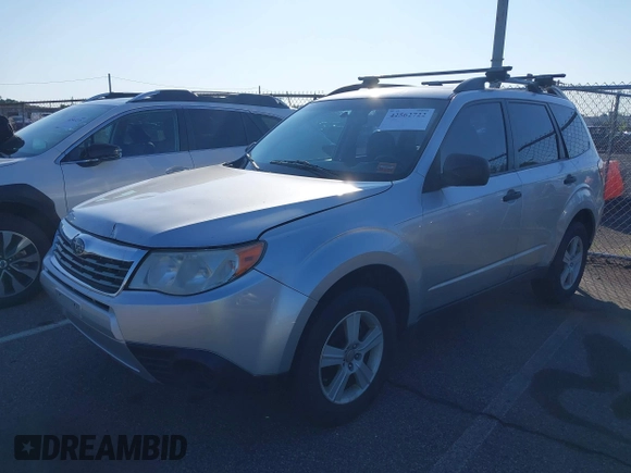2010 Subaru Forester X with VIN JF2SH6BC6AH907478, listed as a IAAI auction lot 42562722 with 159,021 mi miles and . Bid and sale history available at DreamBid. Image 2.