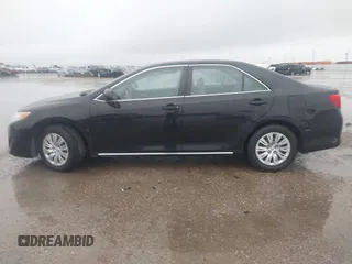2014 Toyota Camry L with VIN 4T1BF1FK0EU823710, listed as a IAAI auction lot 42153523 with 105,468 mi miles and . Bid and sale history available at DreamBid. Image 14.