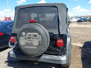 2000 Jeep Wrangler Sport with VIN 1J4FA49S8YP749547, listed as a IAAI auction lot 41861030 with 110,186 mi miles and . Bid and sale history available at DreamBid. Image 16.