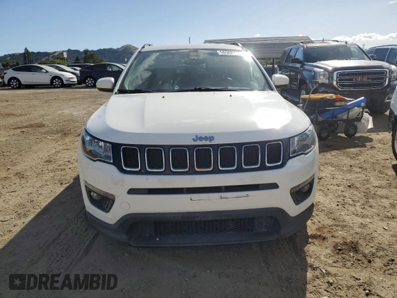 2018 Jeep Compass Latitude with VIN 3C4NJCBB7JT233848, listed as a Copart auction lot 56502715 with 94,665 mi miles and Salvage title. Bid and sale history available at DreamBid. Image 5.