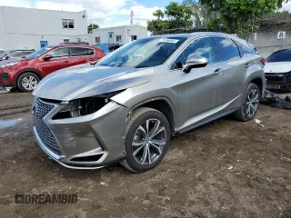 2021 Lexus RX with VIN 2T2HZMAAXMC218526, listed as a Copart auction lot 71356932 with 10,616 mi miles. Bid and sale history available at carsss.com. Image 1.