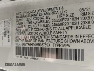 2021 Honda Pilot Touring 8-Passenger z VIN 5FNYF6H94MB087593, wystawiony jako IAAI lot #42153310 z przebiegiem 30 400 mil mil oraz . Historia ofert i sprzedaży dostępna na DreamBid. Obrazek 9.