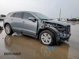 2022 Cadillac XT5 FWD Luxury z VIN 1GYKNAR47NZ116377, wystawiony jako Copart lot #55828415 z przebiegiem 62 276 mil mil oraz Tytuł czysty. Historia ofert i sprzedaży dostępna na DreamBid. Obrazek 4.