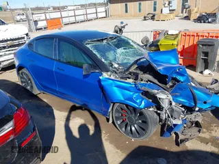 2022 Tesla Model 3 Performance z VIN 5YJ3E1EC9NF337945, wystawiony jako IAAI lot #41419561 z przebiegiem Nie podano mil oraz . Historia ofert i sprzedaży dostępna na DreamBid. Obrazek 12.