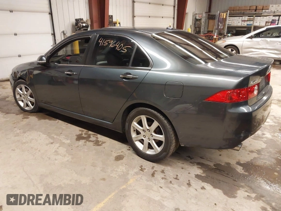 2005 Acura TSX with VIN JH4CL96975C034682, listed as a IAAI auction lot 41596405 with 228,889 mi miles and . Bid and sale history available at DreamBid. Image 3.