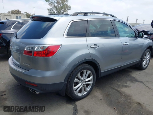 2011 Mazda CX-9 Grand Touring z VIN JM3TB2DA5B0319538, wystawiony jako IAAI lot #42429157 z przebiegiem 88 321 mil mil oraz . Historia ofert i sprzedaży dostępna na DreamBid. Obrazek 4.