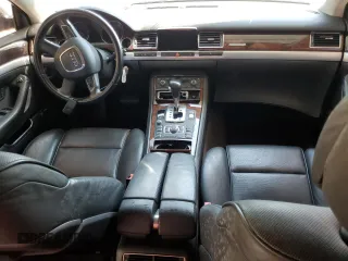 2010 Audi A8 z VIN WAURVAFA7AN005356, wystawiony jako Copart lot #57491155 z przebiegiem Nie podano mil oraz Tytuł czysty. Historia ofert i sprzedaży dostępna na DreamBid. Obrazek 8.