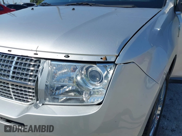 2009 Lincoln MKX with VIN 2LMDU68C49BJ01738, listed as a IAAI auction lot 42203987 with 170,159 mi miles. Bid and sale history available at carsss.com. Image 6.
