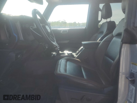 2023 Ford Bronco with VIN 1FMEE5BP0PLC06549, listed as a Copart auction lot 58703305 with 28,051 mi miles and Salvage title. Bid and sale history available at DreamBid. Image 7.