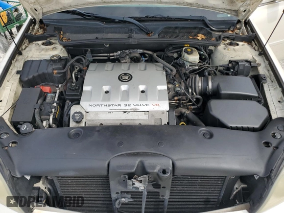 2003 Cadillac DeVille DTS z VIN 1G6KF57973U204531, wystawiony jako Copart lot #45712115 z przebiegiem 107 737 mil mil oraz Szkoda całkowita • Salvage title. Historia ofert i sprzedaży dostępna na DreamBid. Obrazek 11.