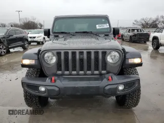 2023 Jeep Wrangler Rubicon with VIN 1C4HJXFN6PW509741, listed as a Copart auction lot 46056775 with 21,755 mi miles and Salvage title. Bid and sale history available at DreamBid. Image 5.
