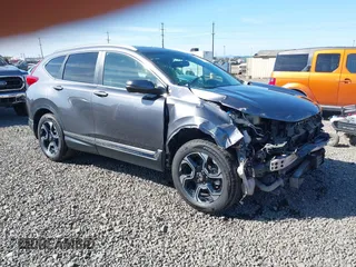 2019 Honda CR-V Touring с VIN JHLRW2H97KX022787, выставлен на аукционе IAAI как лот 42160200 с пробегом 89 391 миль миль и . История ставок и продаж доступна на DreamBid. Изображение 1.