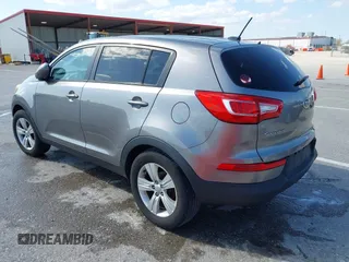 2013 Kia Sportage LX with VIN KNDPB3A24D7365157, listed as a IAAI auction lot 41968652 with 137,055 mi miles and . Bid and sale history available at DreamBid. Image 3.