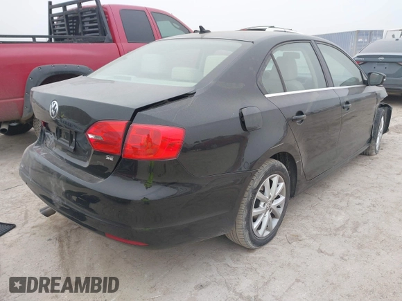 2014 Volkswagen Jetta Sedan SE w/Connectivity with VIN 3VWD07AJ3EM429815, listed as a IAAI auction lot 41288078 with 145,279 mi miles. Bid and sale history available at carsss.com. Image 4.