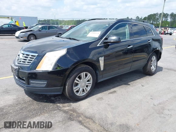 2014 Cadillac SRX with VIN 3GYFNAE30ES641616, listed as a IAAI auction lot 42000120 with 145,000 mi miles and . Bid and sale history available at DreamBid. Image 2.