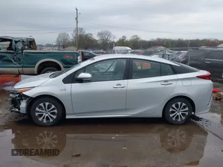 2021 Toyota Prius LE with VIN JTDKAMFP9M3170928, listed as a IAAI auction lot 42123934 with 58,293 mi miles and . Bid and sale history available at DreamBid. Image 15.