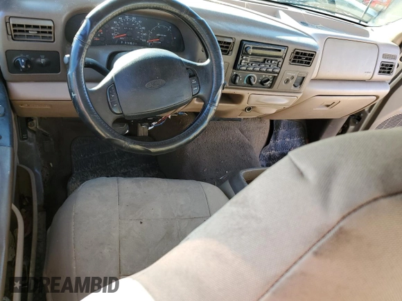 1999 Ford F-250 XL with VIN 1FTNX20F9XEE66766, listed as a Copart auction lot 46595795 with 571,503 mi miles and Salvage title. Bid and sale history available at DreamBid. Image 8.