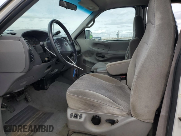 1998 Ford F-150 with VIN 1FTZX18W5WKB91459, listed as a Copart auction lot 52369095 with 185,660 mi miles and Salvage title. Bid and sale history available at DreamBid. Image 7.