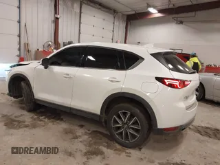 2018 Mazda CX-5 S Premium with VIN JM3KFBDM1J1412088, listed as a IAAI auction lot 41497431 with 65,532 mi miles and . Bid and sale history available at DreamBid. Image 3.