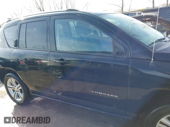 2015 Jeep Compass Sport with VIN 1C4NJDBBXFD114579, listed as a IAAI auction lot 41911501 with 95,732 mi miles and . Bid and sale history available at carsss.com. Image 13.