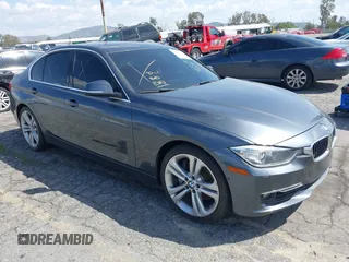 2013 BMW 3 Series 335i with VIN WBA3A9G5XDNP35977, listed as a IAAI auction lot 41957384 with 104,061 mi miles and . Bid and sale history available at DreamBid. Image 1.
