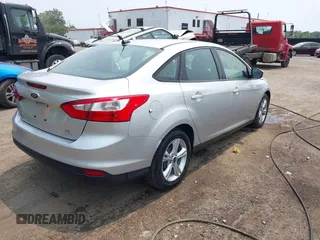 2013 Ford Focus SE with VIN 1FADP3F28DL208516, listed as a IAAI auction lot 42399006 with 103,869 mi miles and . Bid and sale history available at DreamBid. Image 4.