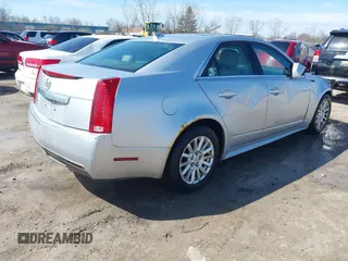 2013 Cadillac CTS Luxury z VIN 1G6DG5E56D0112860, wystawiony jako IAAI lot #41970874 z przebiegiem 125 647 mil mil oraz . Historia ofert i sprzedaży dostępna na DreamBid. Obrazek 4.