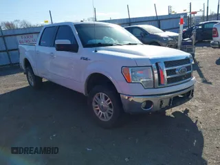 2010 Ford F-150 XL with VIN 1FTFW1CV6AKE75440, listed as a IAAI auction lot 41696347 with 215,410 mi miles. Bid and sale history available at carsss.com. Image 1.