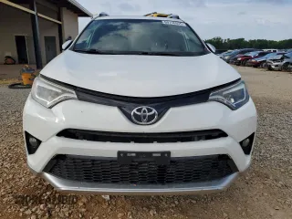 2016 Toyota RAV4 SE with VIN JTMJFREV5GD184074, listed as a Copart auction lot 60116955 with 182,240 mi miles and Salvage title. Bid and sale history available at DreamBid. Image 5.