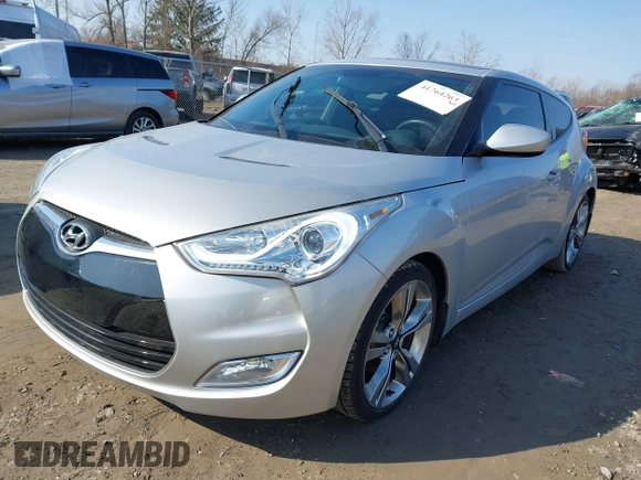 2012 Hyundai Veloster w/Black Int with VIN KMHTC6AD7CU063968, listed as a IAAI auction lot 41764263 with 83,634 mi miles and . Bid and sale history available at DreamBid. Image 2.
