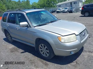 2007 Subaru Forester X with VIN JF1SG65617H725645, listed as a IAAI auction lot 42660092 with 123,228 mi miles and . Bid and sale history available at DreamBid. Image 1.