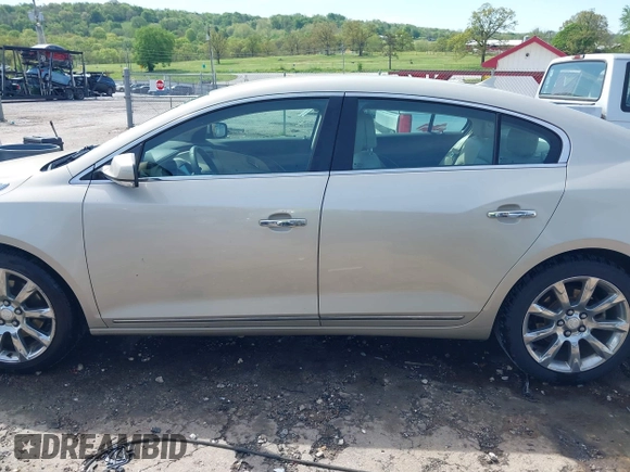 2014 Buick LaCrosse Premium I with VIN 1G4GD5G37EF197099, listed as a IAAI auction lot 42000201 with 199,212 mi miles and . Bid and sale history available at DreamBid. Image 14.