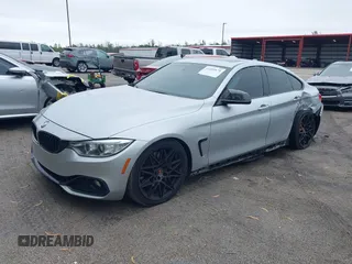 2015 BMW 4 Series 435i with VIN WBA4B1C58FG241018, listed as a IAAI auction lot 41401671 with 79,369 mi miles. Bid and sale history available at carsss.com. Image 2.