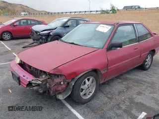1994 Ford Escort z VIN 1FARP11J8RW128776, wystawiony jako IAAI lot #41502714 z przebiegiem 61 582 mil mil oraz . Historia ofert i sprzedaży dostępna na DreamBid. Obrazek 2.