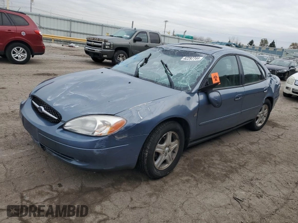2000 Ford Taurus SEL with VIN 1FAFP56S2YG160062, listed as a Copart auction lot 82297744 with 97,218 mi miles and Salvage title. Bid and sale history available at DreamBid. Image 1.