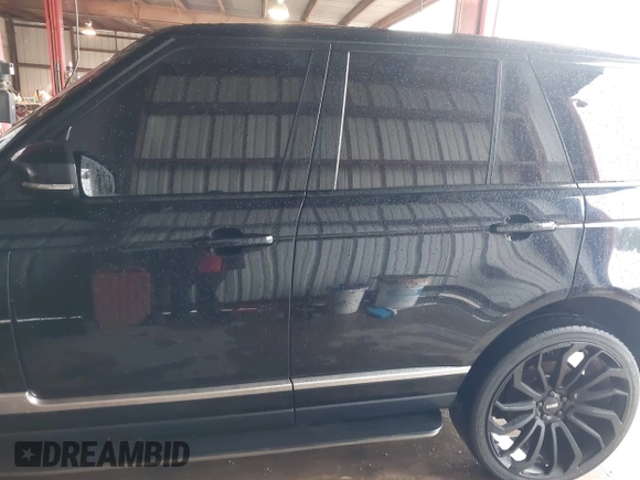 2014 Land Rover Range Rover HSE with VIN SALGS2WF0EA136283, listed as a IAAI auction lot 42161616 with 135,133 mi miles and . Bid and sale history available at DreamBid. Image 14.