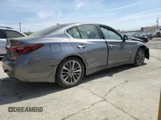 2019 Infiniti Q50 Luxe with VIN JN1EV7AR4KM558896, listed as a Copart auction lot 54249545 with 96,696 mi miles and Salvage title. Bid and sale history available at DreamBid. Image 3.