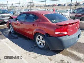 2008 Dodge Avenger SXT with VIN 1B3LC56R98N169618, listed as a IAAI auction lot 40626545 with 153,921 mi miles. Bid and sale history available at carsss.com. Image 3.
