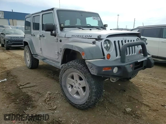 2011 Jeep Wrangler Unlimited Rubicon with VIN 1J4BA6H1XBL571187, listed as a Copart auction lot 54412505 with 83,819 mi miles and Clean title. Bid and sale history available at DreamBid. Image 14.