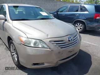 2007 Toyota Camry CE with VIN 4T1BE46KX7U716414, listed as a IAAI auction lot 42116250 with 104,298 mi miles and . Bid and sale history available at DreamBid. Image 6.