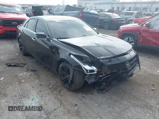 2014 Cadillac CTS Vsport Premium RWD z VIN 1G6AV5S8XE0143389, wystawiony jako IAAI lot #42021009 z przebiegiem 95 102 mil mil oraz . Historia ofert i sprzedaży dostępna na DreamBid. Obrazek 1.